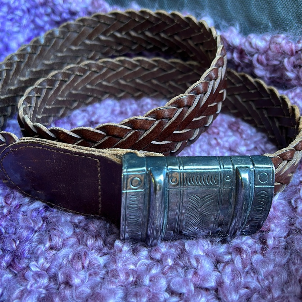 Size small brown leather belt with silver clasp